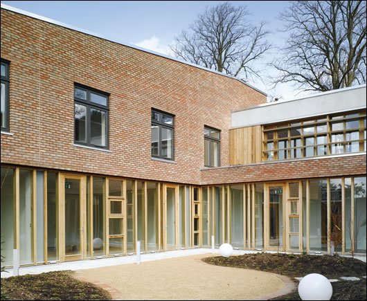 above) the design team required that visibility through courtyard glazing be unimpeded by structure and extensive glazing throughout takes full advantage of the southerly orientation above) the design team required that visibility through courtyard glazing be unimpeded by structure and extensive glazing throughout takes full advantage of the southerly orientation;