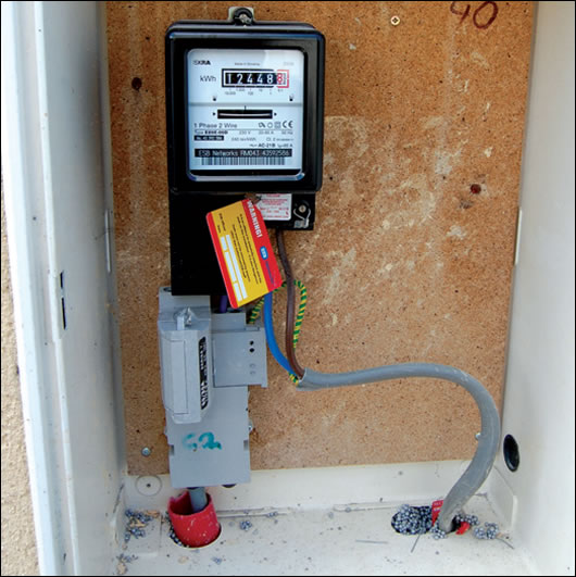 Opening the ESB meter box is a good way to see if a cavity wall has been pump-filled – the insulation can be spotted in the cavity at the bottom