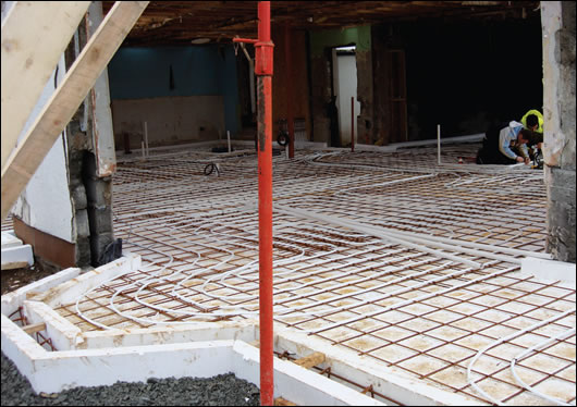 Underfloor heating pipes laid on the insulated foundation system developed by Viking House Underfloor heating pipes laid on the insulated foundation system developed by Viking House