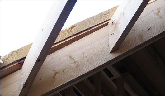 Existing roof sections were renovated with 60mm of Gutex woodfibre board under the roof tiles Existing roof sections were renovated with 60mm of Gutex woodfibre board under the roof tiles