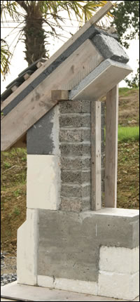 A section shows the comprehensively insulated roof, wall and foundations