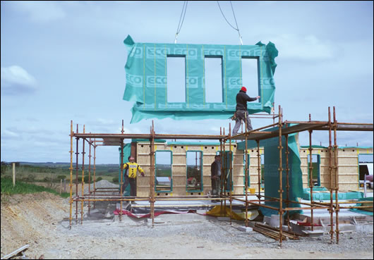 the Eco Timber Frame system being lifted into place on site