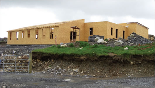 Oak Barn Construction erected the timber frame system at Michelle and Simon Gethings’ Mayo home