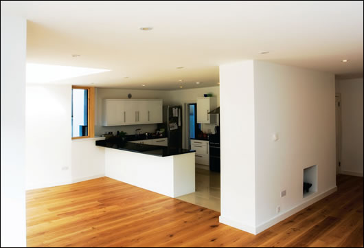 The new rear extension houses a bright and spacious kitchen and dining space with underfloor heating