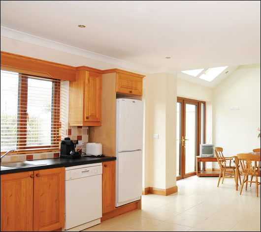 The kitchen was internally insulated and features an electric Velux roof window powered by a small solar PV panel