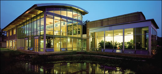 The building is adjacent to a natural wetland system which aids in treating and recycling wastewater