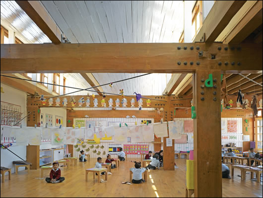 The classrooms are pleasant learning environments and are warm, bright and airy. They each open onto the planted courtyard (below), which provides them with natural light and ventilation