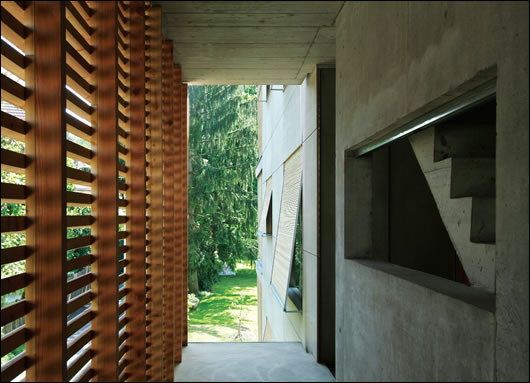 External wooden shades protect against overheating