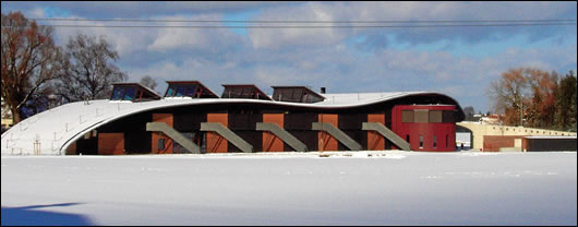 The undulating green roof, which eventually rolls down to converge with the fields below