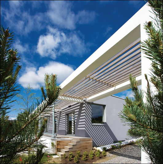 A brise soleil on the south façade is designed to shade the house from the high summer sun, while still allowing the low winter sun to let natural light in