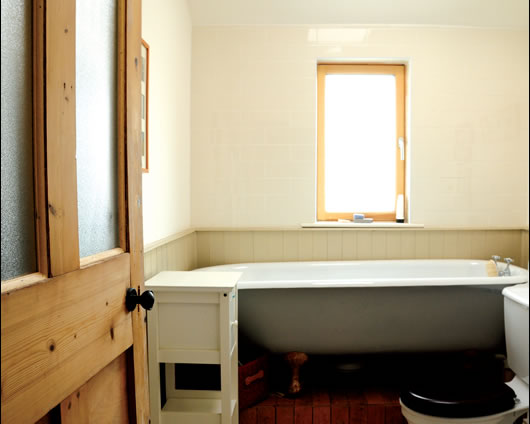 Salvaged materials includes doors, bath and toilet Salvaged materials includes doors, bath and toilet