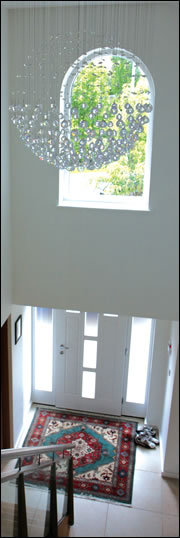 A double height entrance hall reduces the electrical lighting requirement A double height entrance hall reduces the electrical lighting requirement