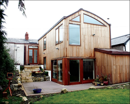 The walls are timber-clad to the south and lime-rendered to the street-facing north The walls are timber-clad to the south and lime-rendered to the street-facing north